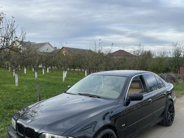 Черный БМВ 5 Серия, объемом двигателя 2.5 л и пробегом 300 тыс. км за 3350 $, фото 1 на Automoto.ua