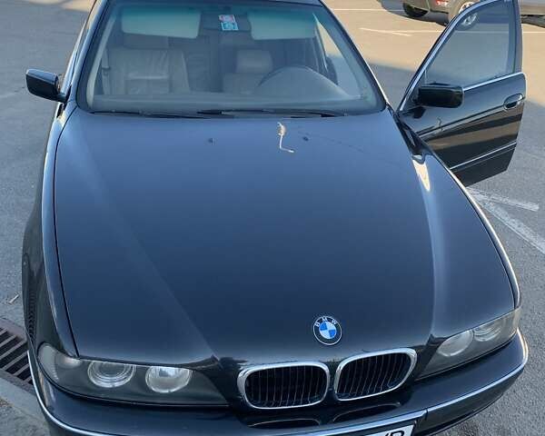 Черный БМВ 5 Серия, объемом двигателя 2.5 л и пробегом 230 тыс. км за 6000 $, фото 1 на Automoto.ua