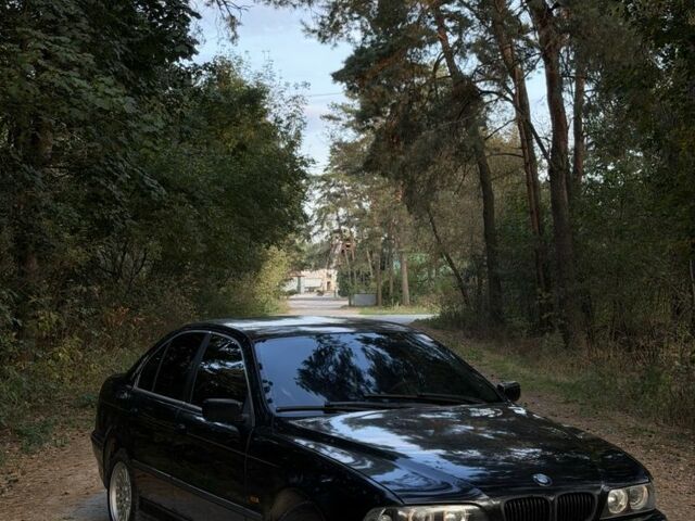 Черный БМВ 5 Серия, объемом двигателя 2 л и пробегом 325 тыс. км за 3006 $, фото 1 на Automoto.ua