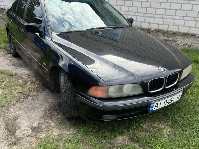 Черный БМВ 5 Серия, объемом двигателя 2.5 л и пробегом 306 тыс. км за 4500 $, фото 1 на Automoto.ua