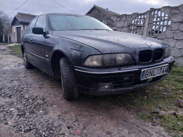 Черный БМВ 5 Серия, объемом двигателя 2.5 л и пробегом 508 тыс. км за 1200 $, фото 1 на Automoto.ua