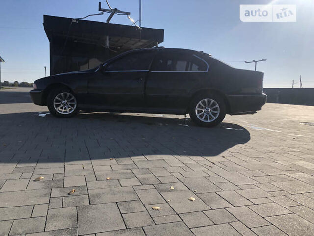 Черный БМВ 5 Серия, объемом двигателя 1.99 л и пробегом 296 тыс. км за 3300 $, фото 1 на Automoto.ua