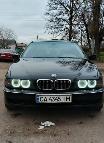 Черный БМВ 5 Серия, объемом двигателя 2.5 л и пробегом 500 тыс. км за 4000 $, фото 1 на Automoto.ua