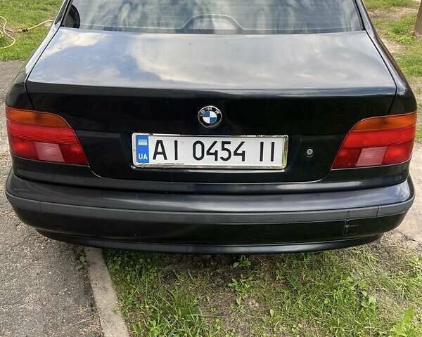 Черный БМВ 5 Серия, объемом двигателя 2.5 л и пробегом 306 тыс. км за 4500 $, фото 1 на Automoto.ua