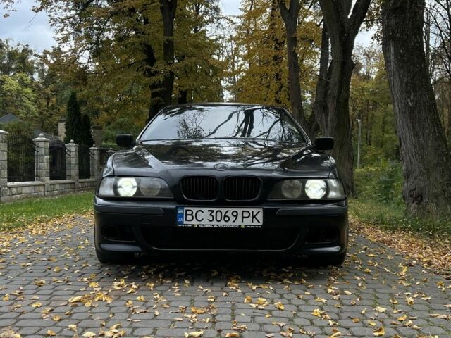 Черный БМВ 5 Серия, объемом двигателя 2.5 л и пробегом 299 тыс. км за 2999 $, фото 1 на Automoto.ua