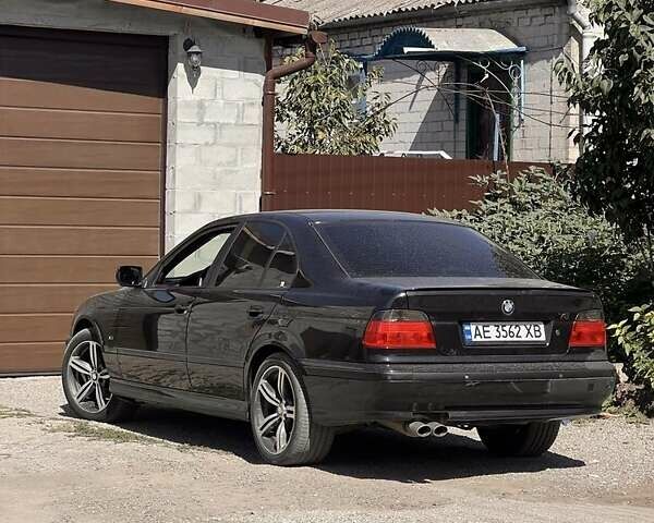 Черный БМВ 5 Серия, объемом двигателя 3.5 л и пробегом 1000 тыс. км за 2700 $, фото 1 на Automoto.ua