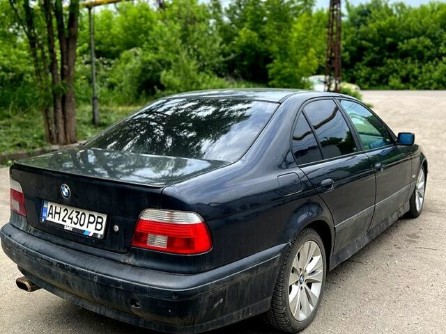 Чорний БМВ 5 Серія, об'ємом двигуна 2 л та пробігом 200 тис. км за 2700 $, фото 1 на Automoto.ua
