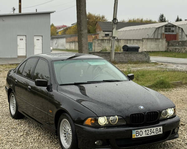 Черный БМВ 5 Серия, объемом двигателя 3 л и пробегом 400 тыс. км за 5950 $, фото 1 на Automoto.ua