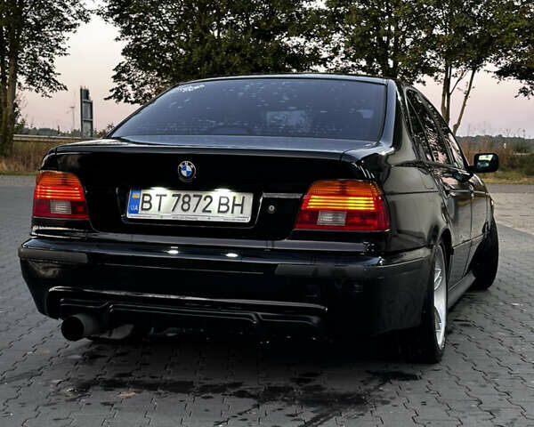 Черный БМВ 5 Серия, объемом двигателя 1.99 л и пробегом 615 тыс. км за 5619 $, фото 1 на Automoto.ua