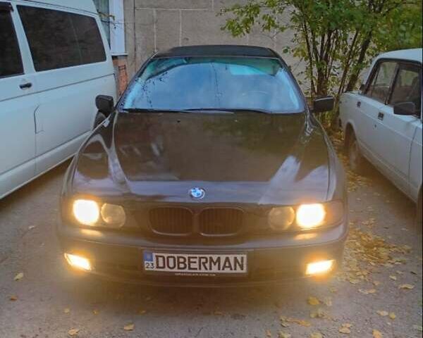 Черный БМВ 5 Серия, объемом двигателя 2.8 л и пробегом 350 тыс. км за 4300 $, фото 1 на Automoto.ua