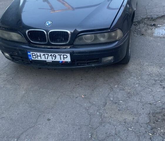 Чорний БМВ 5 Серія, об'ємом двигуна 2.5 л та пробігом 111 тис. км за 2498 $, фото 1 на Automoto.ua