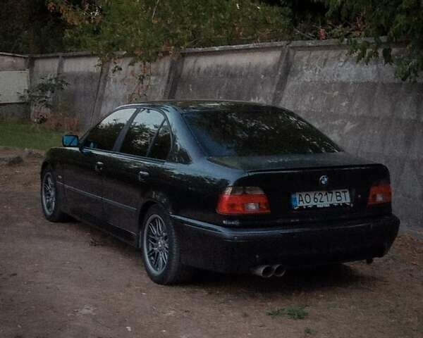 Черный БМВ 5 Серия, объемом двигателя 4.4 л и пробегом 470 тыс. км за 5800 $, фото 1 на Automoto.ua