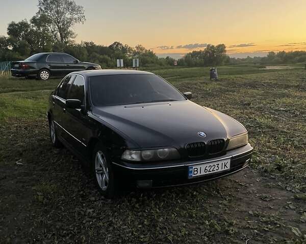 Черный БМВ 5 Серия, объемом двигателя 1.99 л и пробегом 435 тыс. км за 4300 $, фото 1 на Automoto.ua