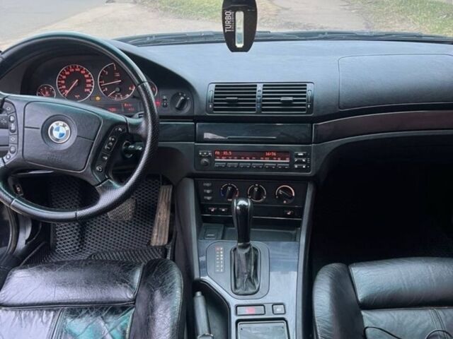 Черный БМВ 5 Серия, объемом двигателя 2.5 л и пробегом 409 тыс. км за 4450 $, фото 1 на Automoto.ua