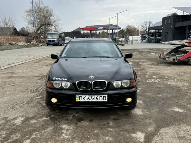 Черный БМВ 5 Серия, объемом двигателя 2.5 л и пробегом 300 тыс. км за 2699 $, фото 1 на Automoto.ua