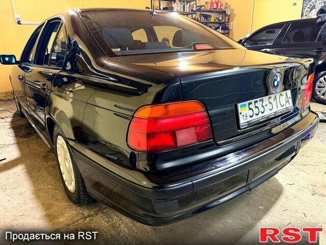 Чорний БМВ 5 Серія, об'ємом двигуна 2 л та пробігом 249 тис. км за 4480 $, фото 1 на Automoto.ua