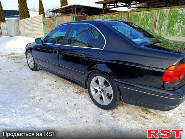Черный БМВ 5 Серия, объемом двигателя 2 л и пробегом 260 тыс. км за 3700 $, фото 1 на Automoto.ua