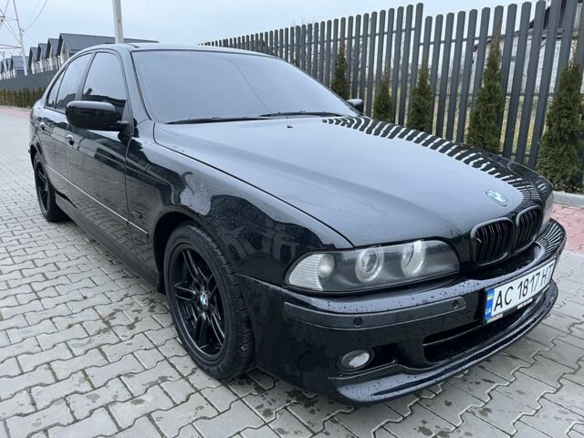 Черный БМВ 5 Серия, объемом двигателя 2.5 л и пробегом 300 тыс. км за 6700 $, фото 1 на Automoto.ua