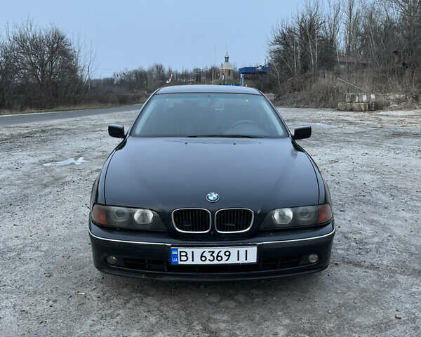 Черный БМВ 5 Серия, объемом двигателя 2.5 л и пробегом 470 тыс. км за 4100 $, фото 1 на Automoto.ua