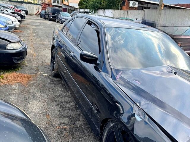 Черный БМВ 5 Серия, объемом двигателя 2 л и пробегом 274 тыс. км за 3900 $, фото 1 на Automoto.ua