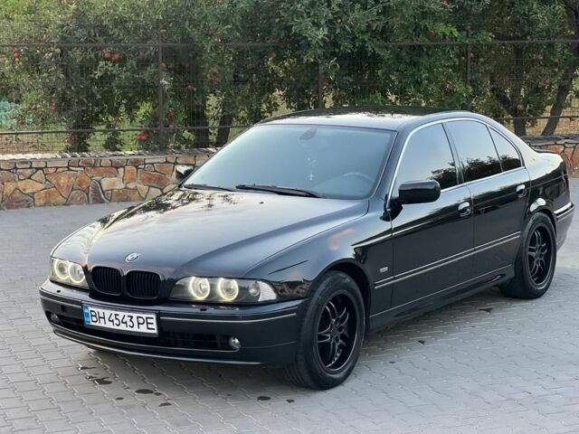 Черный БМВ 5 Серия, объемом двигателя 2.5 л и пробегом 317 тыс. км за 5100 $, фото 1 на Automoto.ua