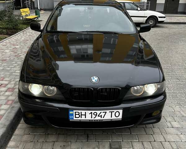 Черный БМВ 5 Серия, объемом двигателя 2.5 л и пробегом 313 тыс. км за 5500 $, фото 1 на Automoto.ua