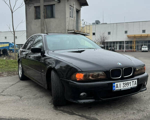 Черный БМВ 5 Серия, объемом двигателя 2.5 л и пробегом 300 тыс. км за 4300 $, фото 1 на Automoto.ua