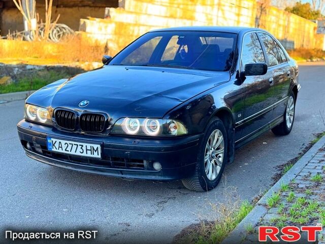 Черный БМВ 5 Серия, объемом двигателя 2.5 л и пробегом 200 тыс. км за 3800 $, фото 1 на Automoto.ua
