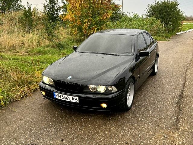 Черный БМВ 5 Серия, объемом двигателя 2.5 л и пробегом 324 тыс. км за 6000 $, фото 1 на Automoto.ua