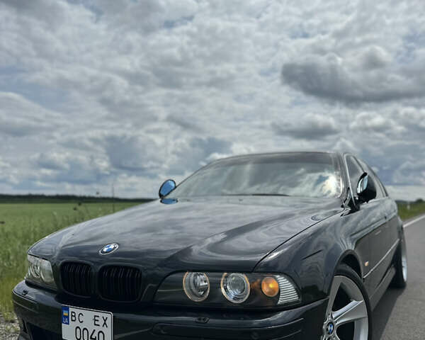 Черный БМВ 5 Серия, объемом двигателя 2.5 л и пробегом 468 тыс. км за 8999 $, фото 1 на Automoto.ua