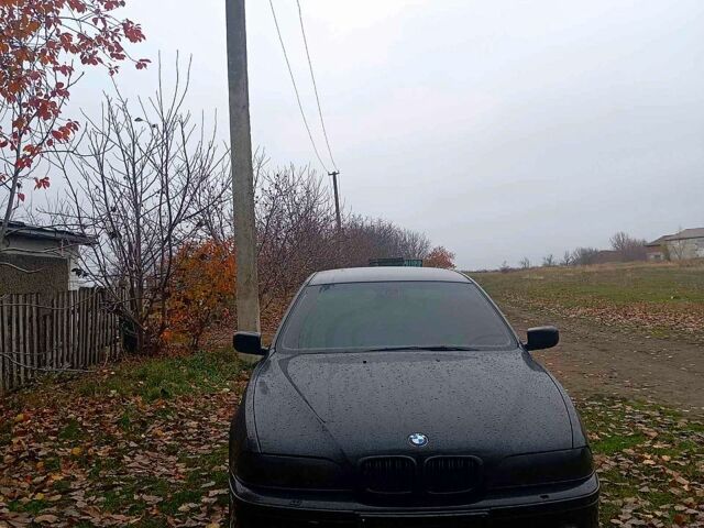 Черный БМВ 5 Серия, объемом двигателя 2.5 л и пробегом 378 тыс. км за 5700 $, фото 1 на Automoto.ua