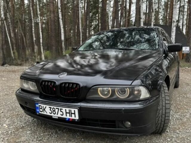 Черный БМВ 5 Серия, объемом двигателя 2.5 л и пробегом 401 тыс. км за 6499 $, фото 1 на Automoto.ua