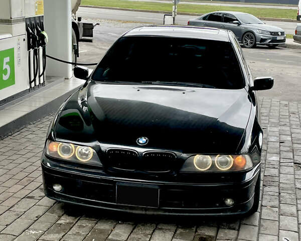 Черный БМВ 5 Серия, объемом двигателя 3 л и пробегом 446 тыс. км за 6500 $, фото 1 на Automoto.ua
