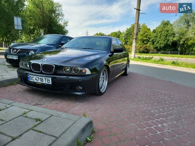 Черный БМВ 5 Серия, объемом двигателя 4.4 л и пробегом 650 тыс. км за 7000 $, фото 1 на Automoto.ua