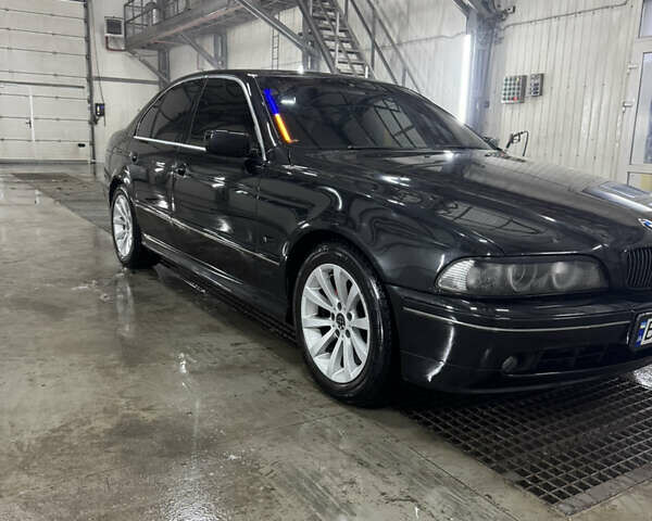 Черный БМВ 5 Серия, объемом двигателя 2.5 л и пробегом 460 тыс. км за 7100 $, фото 1 на Automoto.ua