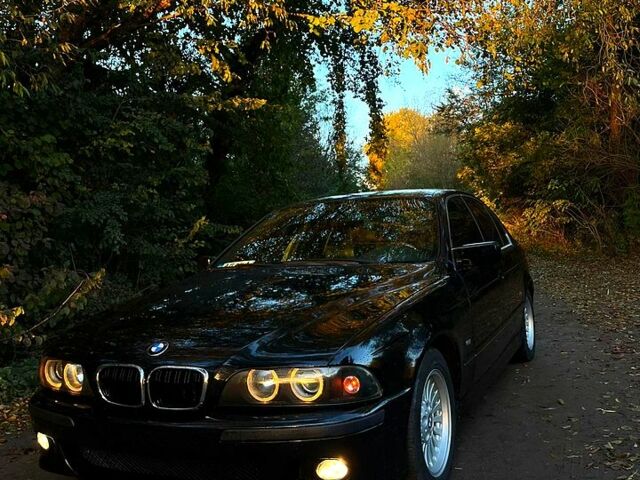 Черный БМВ 5 Серия, объемом двигателя 2.5 л и пробегом 447 тыс. км за 3400 $, фото 1 на Automoto.ua