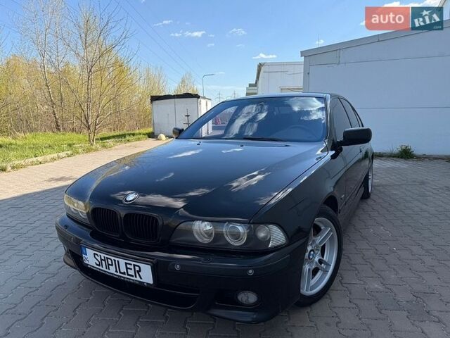 Черный БМВ 5 Серия, объемом двигателя 3.5 л и пробегом 253 тыс. км за 8500 $, фото 1 на Automoto.ua