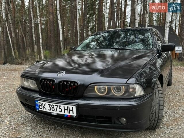 Черный БМВ 5 Серия, объемом двигателя 2.5 л и пробегом 401 тыс. км за 5500 $, фото 1 на Automoto.ua