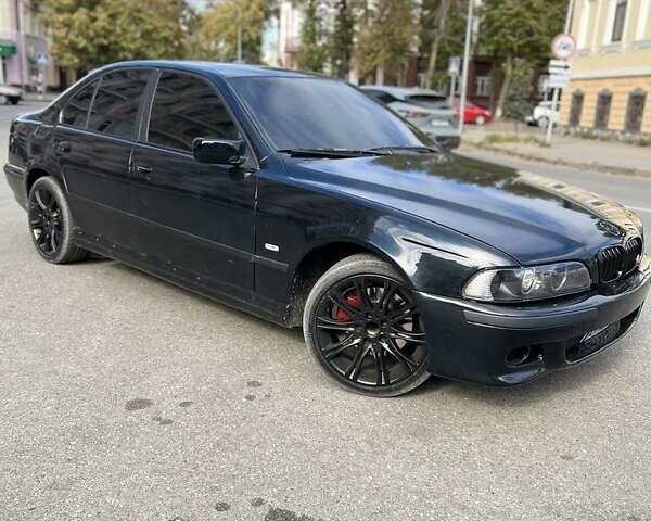 Черный БМВ 5 Серия, объемом двигателя 3.5 л и пробегом 300 тыс. км за 5199 $, фото 1 на Automoto.ua
