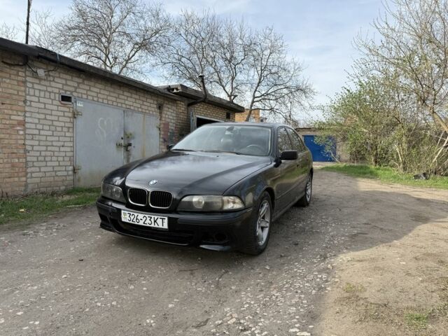 Черный БМВ 5 Серия, объемом двигателя 2.5 л и пробегом 406 тыс. км за 2750 $, фото 1 на Automoto.ua