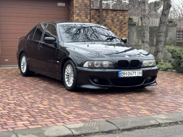 Черный БМВ 5 Серия, объемом двигателя 2.5 л и пробегом 235 тыс. км за 5400 $, фото 1 на Automoto.ua