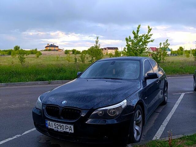 Черный БМВ 5 Серия, объемом двигателя 2.5 л и пробегом 302 тыс. км за 6900 $, фото 1 на Automoto.ua