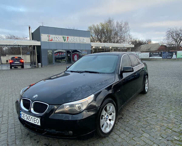 Черный БМВ 5 Серия, объемом двигателя 2.5 л и пробегом 374 тыс. км за 7300 $, фото 1 на Automoto.ua