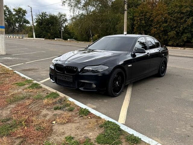 Черный БМВ 5 Серия, объемом двигателя 3 л и пробегом 241 тыс. км за 12699 $, фото 1 на Automoto.ua