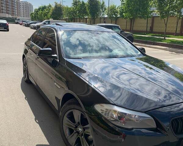 Черный БМВ 5 Серия, объемом двигателя 2 л и пробегом 119 тыс. км за 14300 $, фото 1 на Automoto.ua