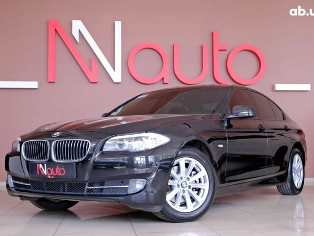 Черный БМВ 5 Серия, объемом двигателя 2 л и пробегом 187 тыс. км за 11900 $, фото 1 на Automoto.ua