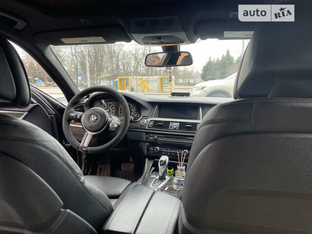 Черный БМВ 5 Серия, объемом двигателя 2 л и пробегом 98 тыс. км за 18999 $, фото 1 на Automoto.ua