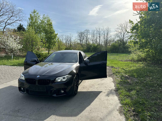 Черный БМВ 5 Серия, объемом двигателя 2.98 л и пробегом 145 тыс. км за 19000 $, фото 1 на Automoto.ua