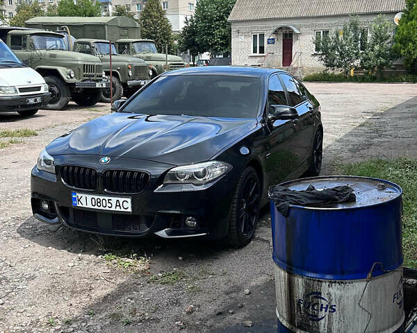 Черный БМВ 5 Серия, объемом двигателя 3 л и пробегом 95 тыс. км за 21000 $, фото 1 на Automoto.ua
