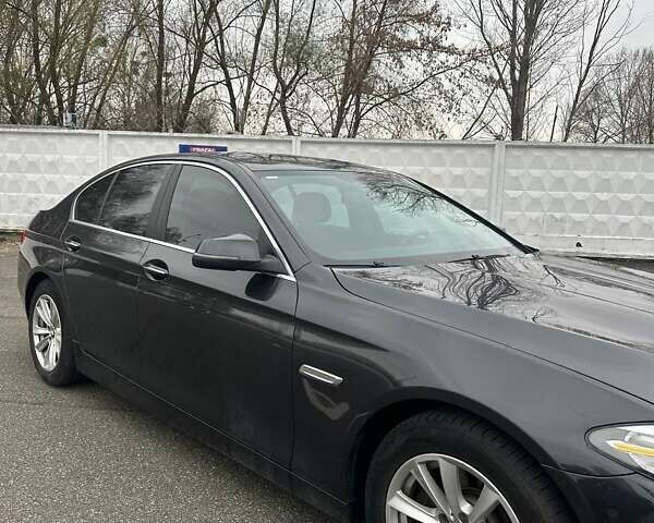 Черный БМВ 5 Серия, объемом двигателя 2 л и пробегом 160 тыс. км за 16900 $, фото 1 на Automoto.ua